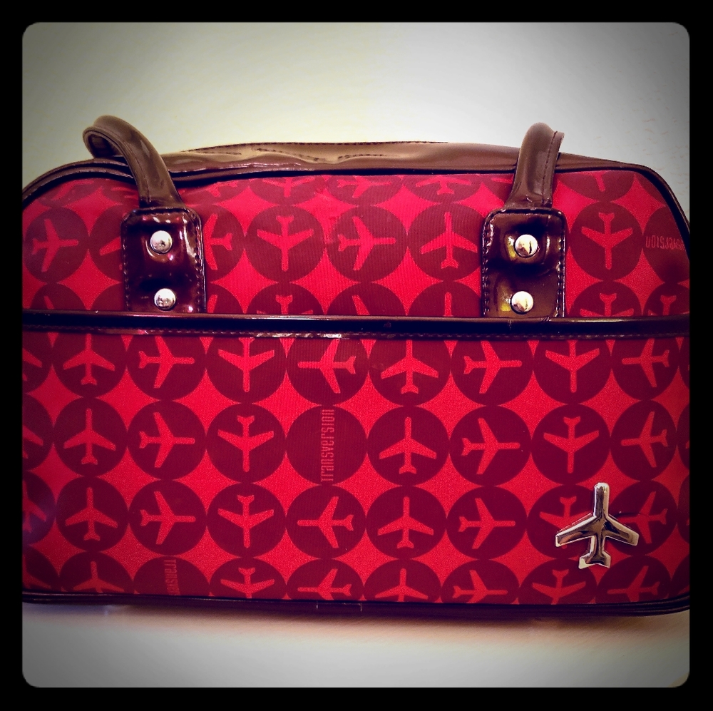 Transversion purse w/airplane pattern